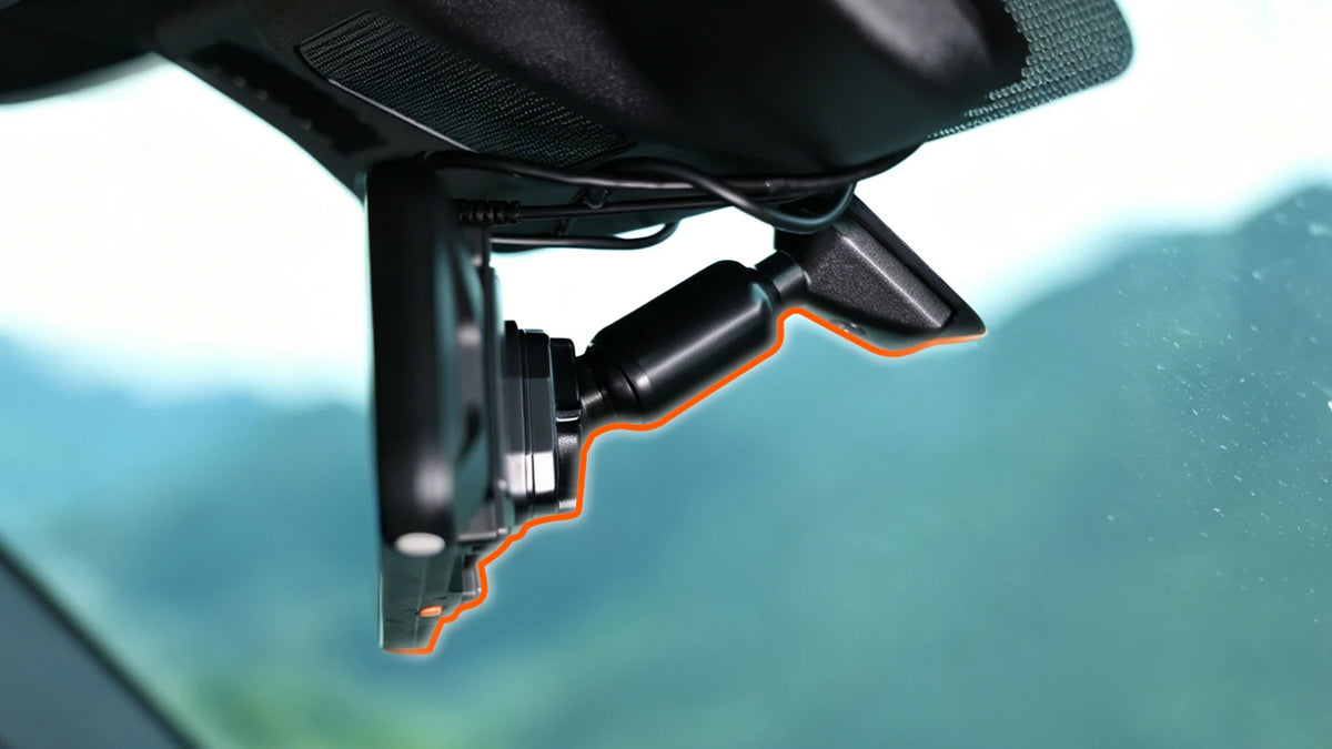 WOLFBOX FlexPilot OEM-style windshield integration with a clean camera installation behind the mirror.
